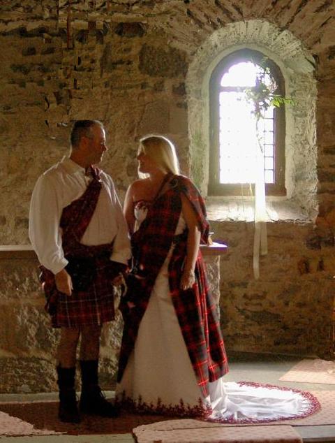 Handfasting, decked in
plaids. Copyright.
