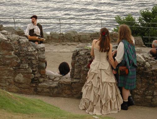 Alec and Kirsten, listening to Tales at Urquhart Castle